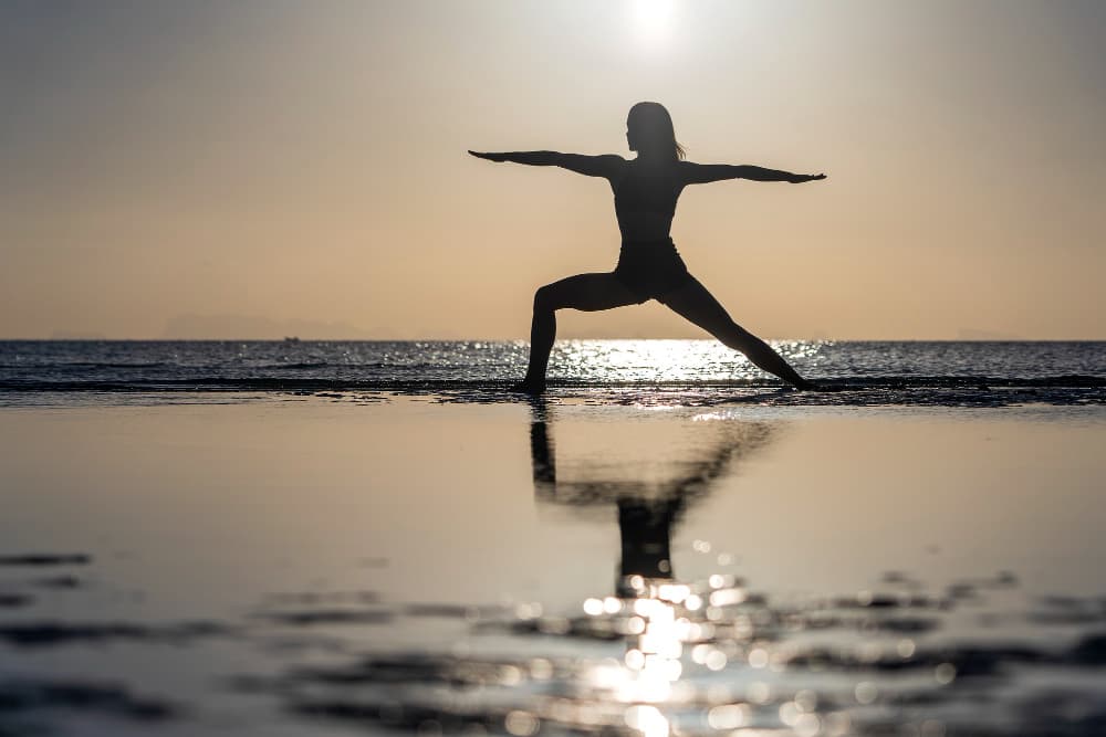 Stretching by the beach